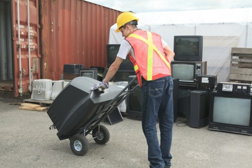 Inspector reviewing documentation during a waste clearance investigation